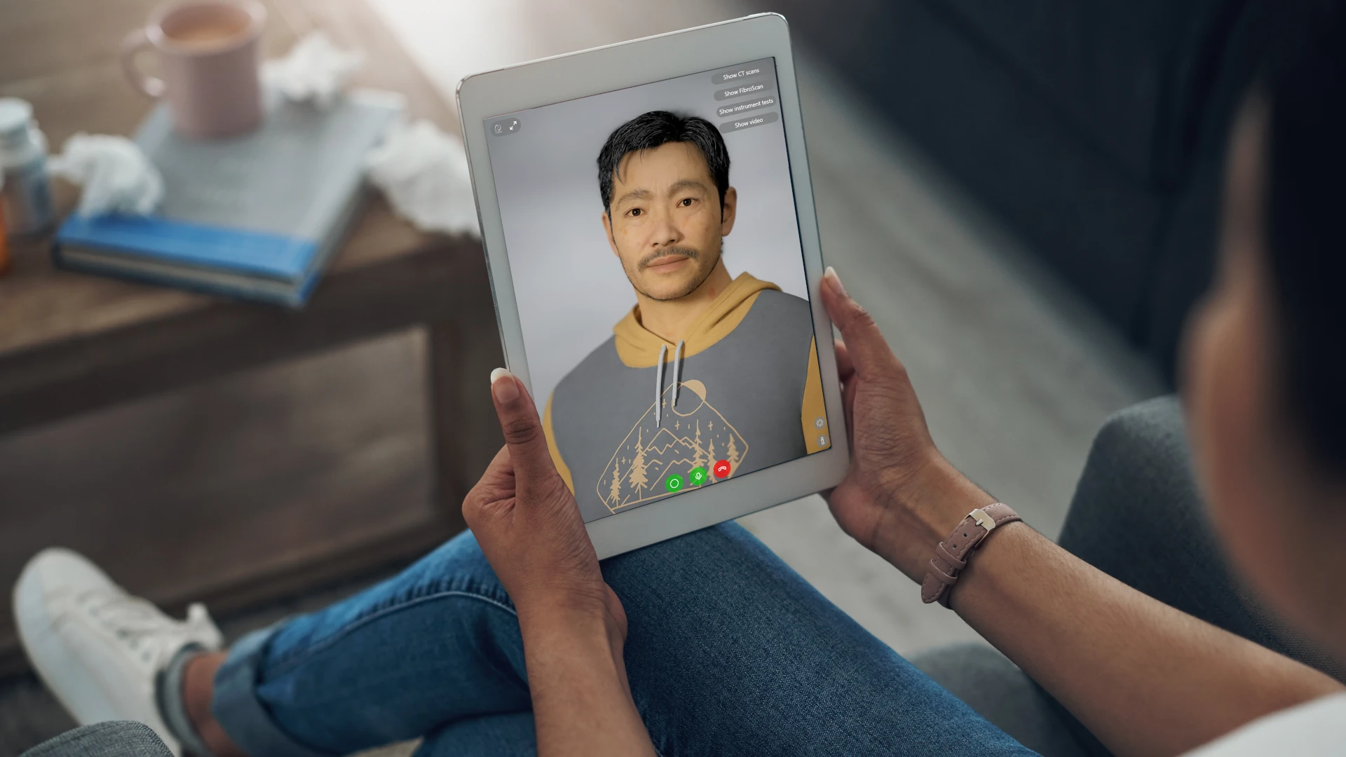 A person holding a tablet with a virtual patient